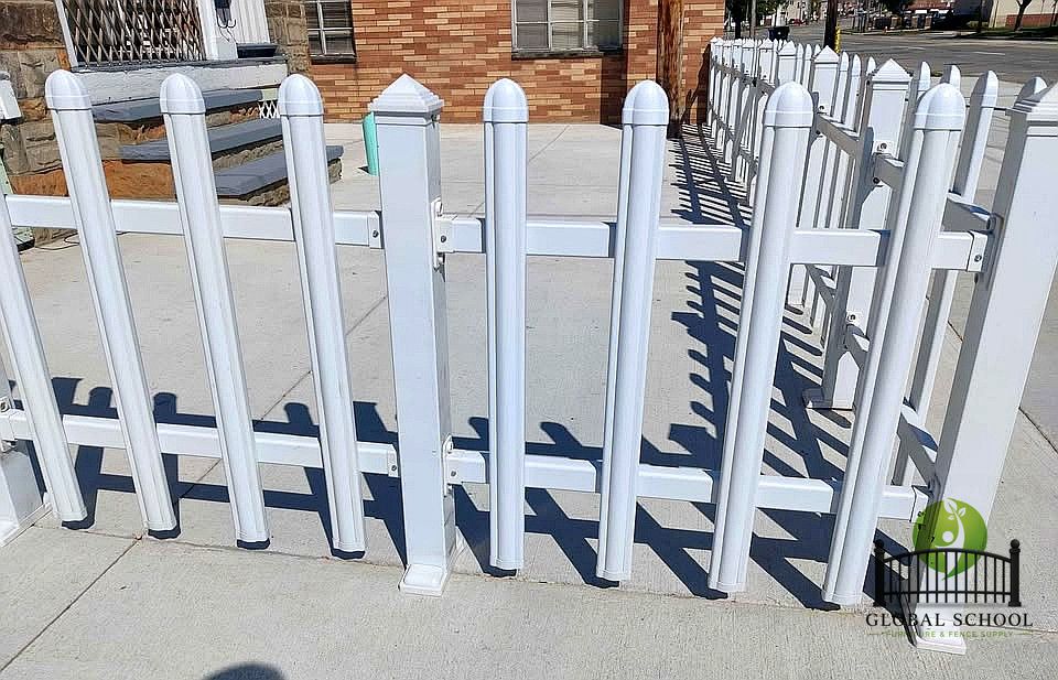 White vinyl picket fence